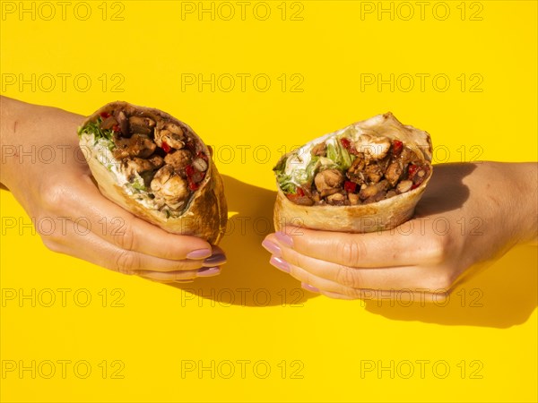 Close up woman holding traditional mexican food