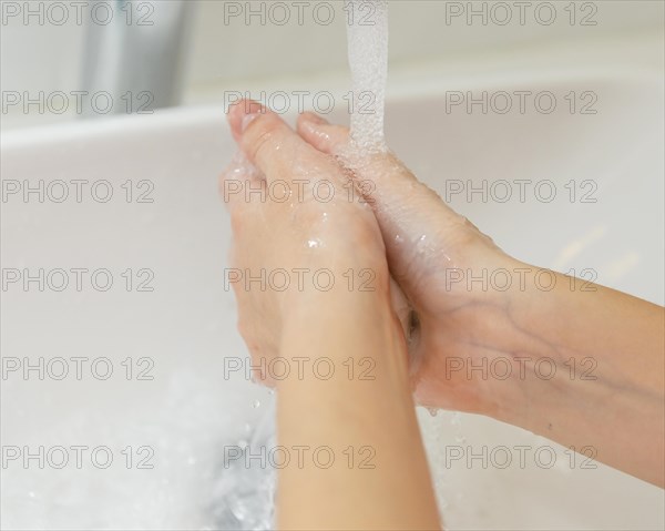 Little girl washing her hands. Resolution and high quality beautiful photo