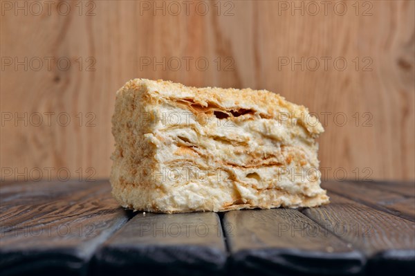 Piece of Napoleon cake on a table