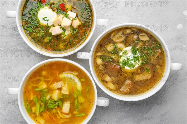 Overhead view of three kinds of healthy soup