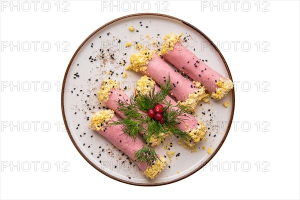 Delicious rolls made of ham stuffed with cheese