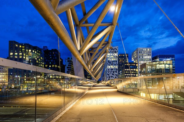 Oslo skyline modern city architecture building with bridge in Barcode District at night in Oslo