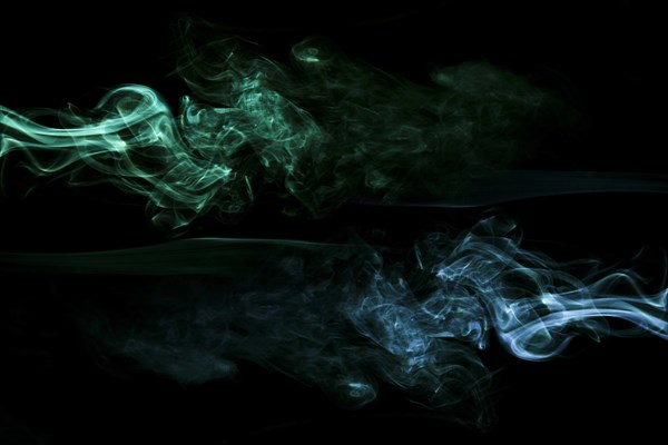 Realistic green blue smoke black background