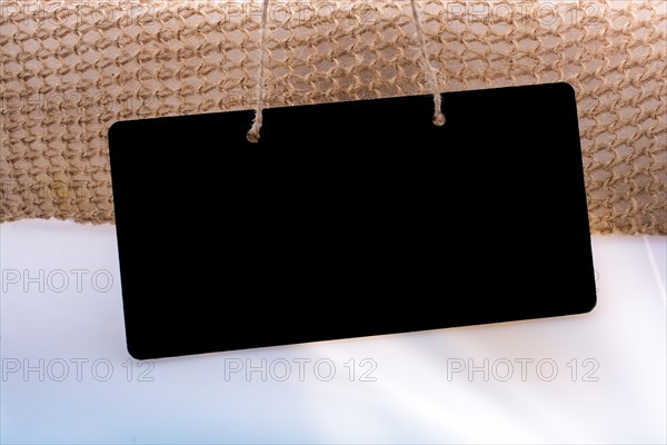 Rectangular shaped black notice board on white ground