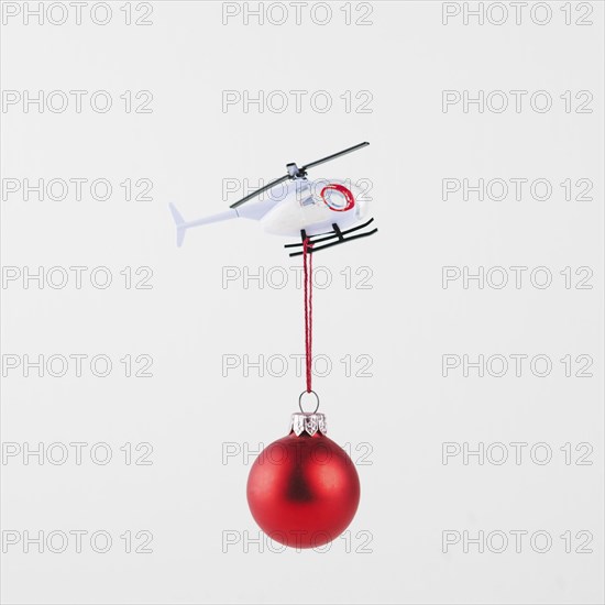 Small bauble hanging flying helicopter. Resolution and high quality beautiful photo