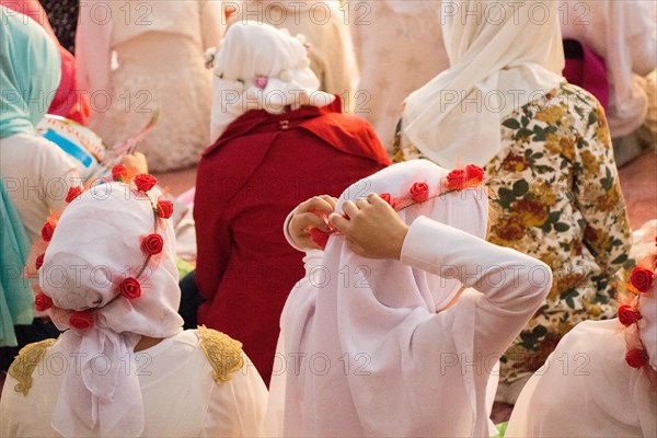 Small girls with hijab in a big mosque