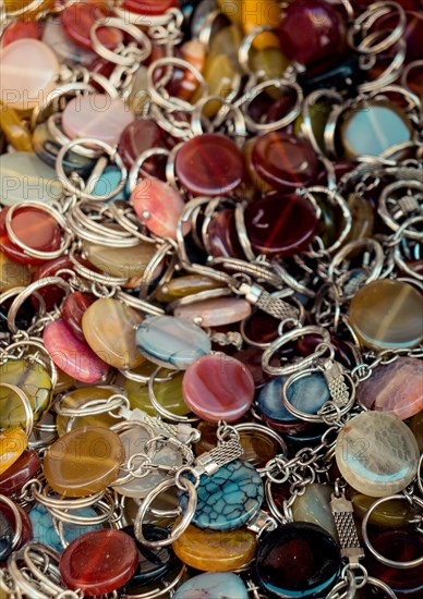 Key holder ring attached to a semi precious stone gem