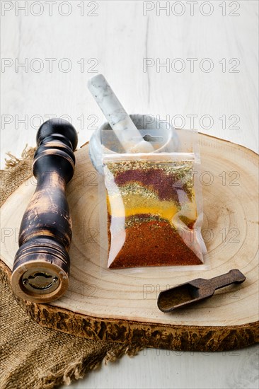 Mixture of different spices in plastic packaging