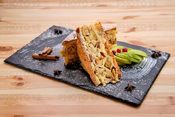 Apple pie on slate plate