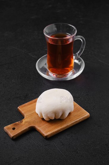 Sweet dessert mochi with coconut chips with fruit tea