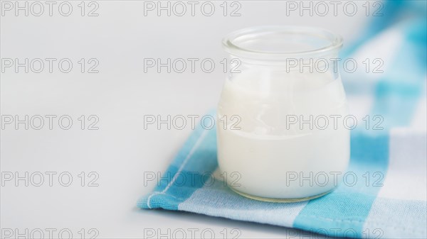 Delicious natural yogurt container