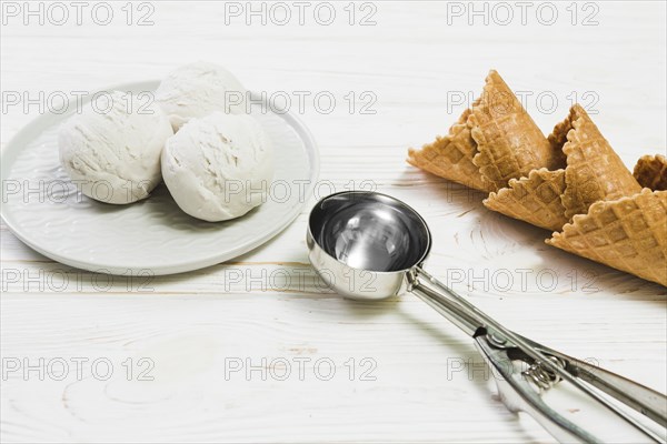 Scoop near ice cream balls waffle cones. Resolution and high quality beautiful photo