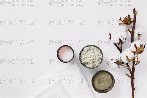 Top view scrubs candle napkin cotton twig white surface. Resolution and high quality beautiful photo