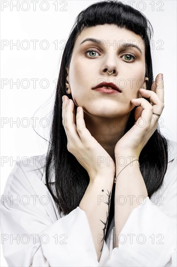Portrait young woman with long black hair and red lips