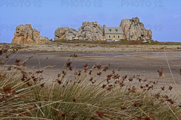 Country house between rocks near Le Gouffre