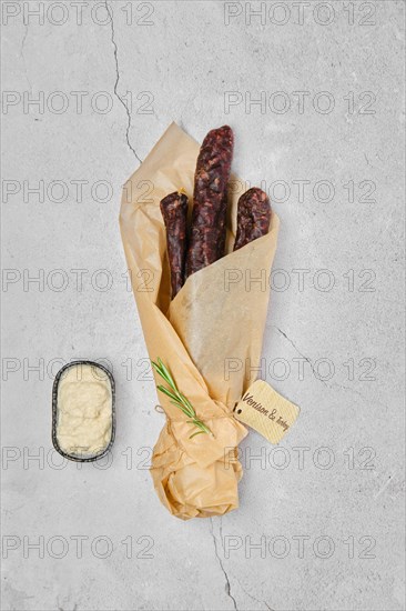 Overhead view of dried sausage made of venison and turkey spicy meat