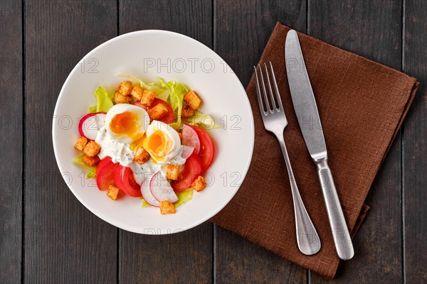 Top view of salad with fresh tomato