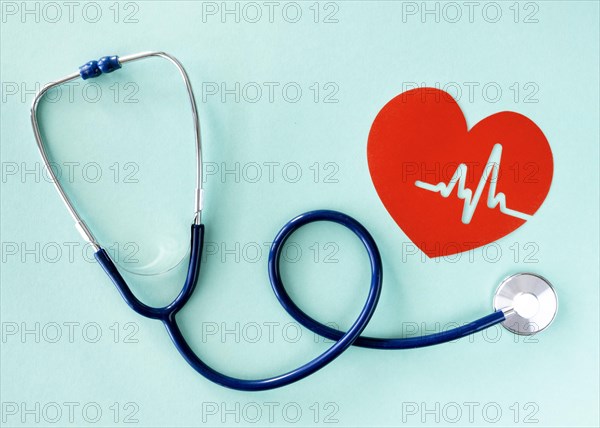 Flat lay stethoscope with paper heart