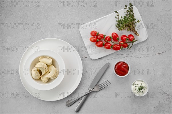 Top view of frozen semifinished dumplings stuffed with pork meat