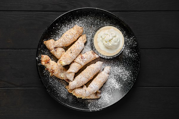 Top view of mini croissant with banana and pear with icecream