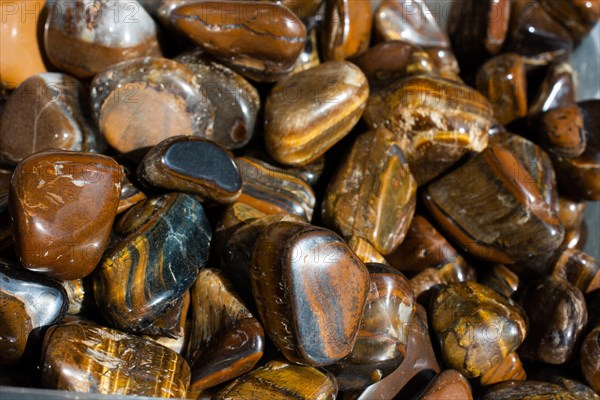 Tiger's eye and hawk's eye gemstone as natural mineral rock specimen