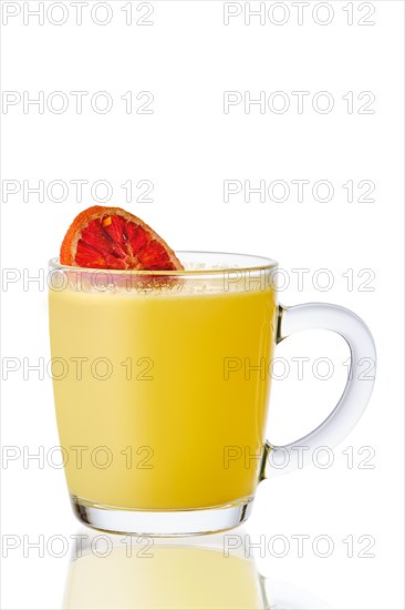 Transparent cup with handle with hot citrus drink isolated on white background