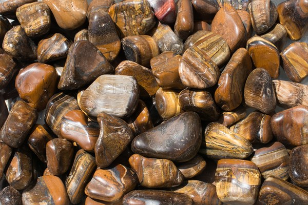 Tiger's eye and hawk's eye gemstone as natural mineral rock specimen