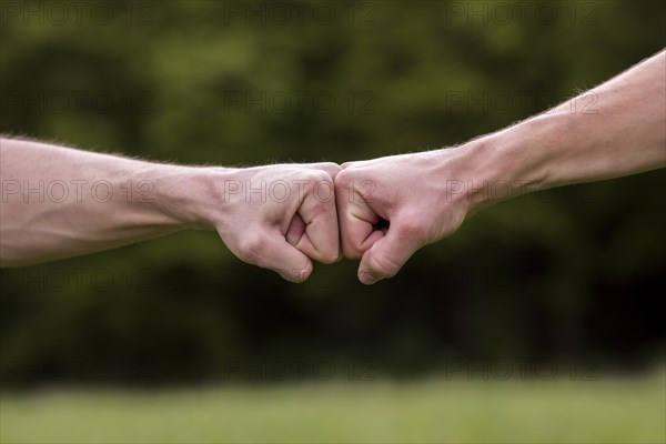 Fist bump welcome gesture