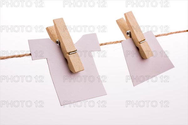 Clothespins holding clothes