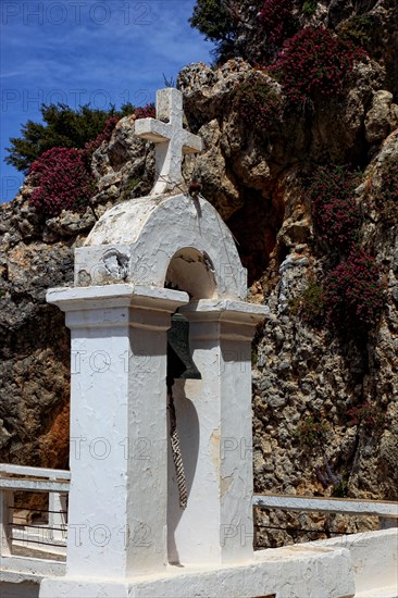 Bell tower of the monastery in the mountains near the coastal road to Agios Nikolaos