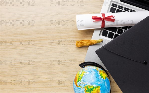 Top view globe with academic cap laptop. Resolution and high quality beautiful photo