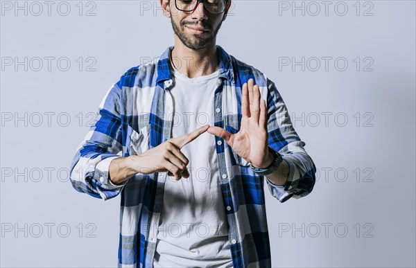 Deaf and dumb people speaking in sign language. Man speaking in sign language. Manual gestures of people with hearing problems. Person speaking in sign language