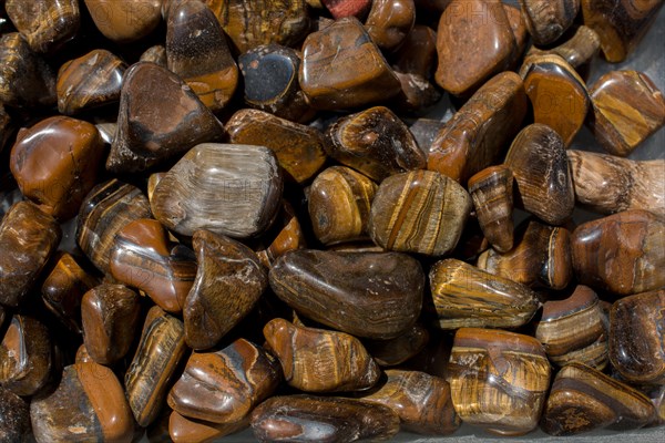 Tiger's eye and hawk's eye gemstone as natural mineral rock specimen