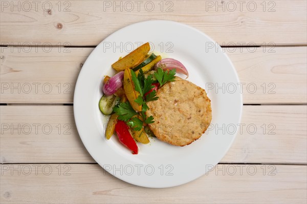 Fish cutlet with grilled potato