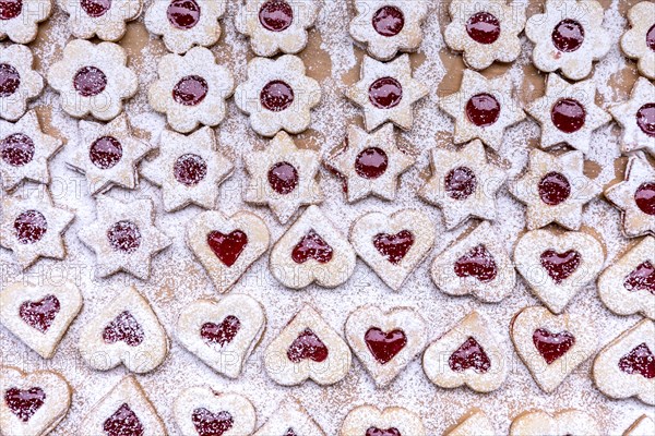 Freshly baked Spitzbuben in the shape of a heart