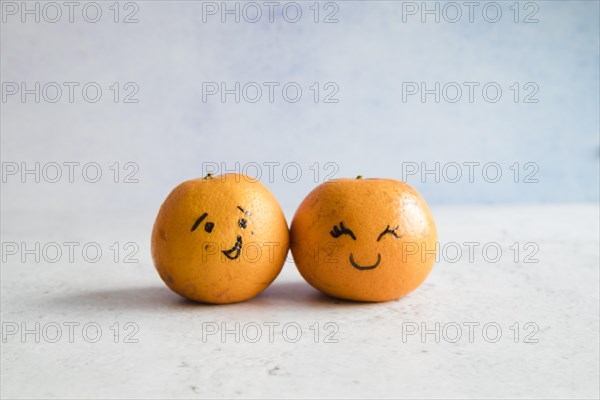 Tangerines with funny faces. Resolution and high quality beautiful photo