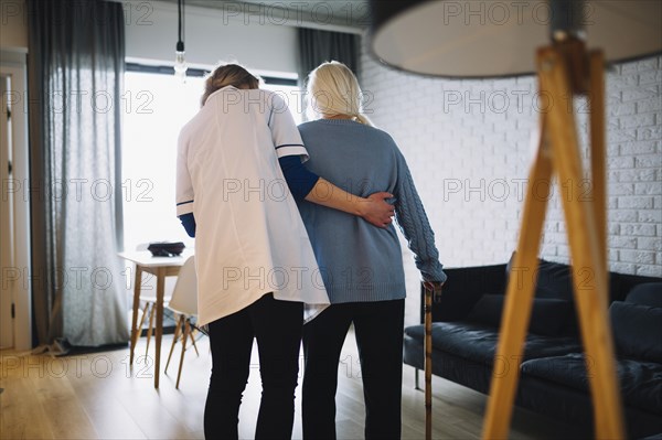 Woman walking with nurse old age home. Resolution and high quality beautiful photo