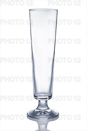 Empty transparent sling glass with reflection isolated on white
