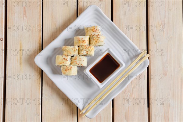 Top view of portion of rolls with salmon