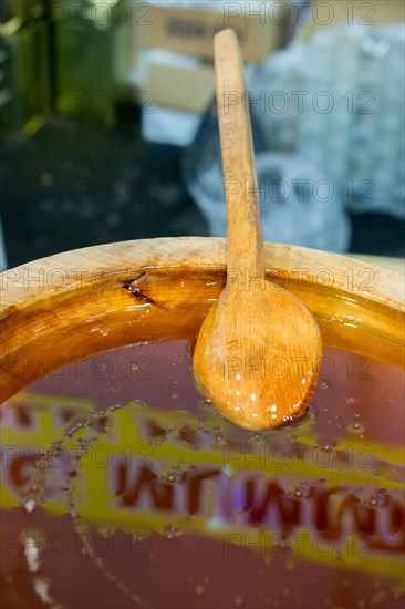 Fresh natural yellow honey in liquid form
