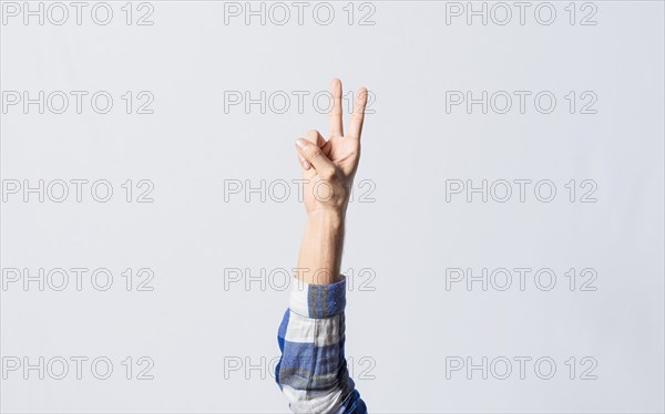 Counting the number TWO in sign language. Deaf and dumb counting the number TWO in sign language