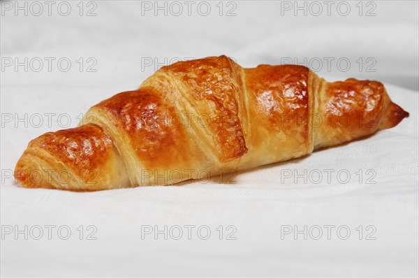 Fresh baked croissants on napkin