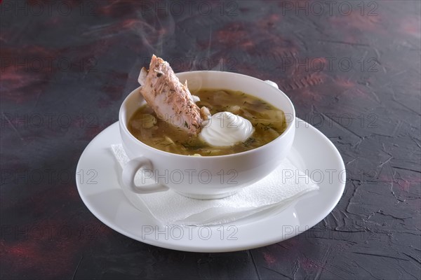 Beef bouillon with meat on a bone