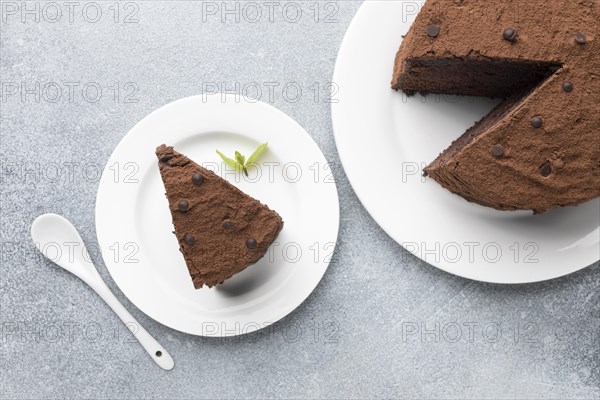 Top view chocolate cake slice with spoon mint. Resolution and high quality beautiful photo
