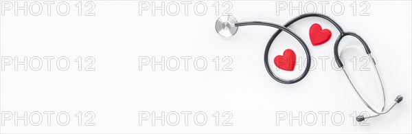 Top view of paper hearts with stethoscope and copy space. Resolution and high quality beautiful photo