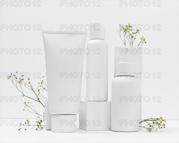 Front view cosmetic products with copy space