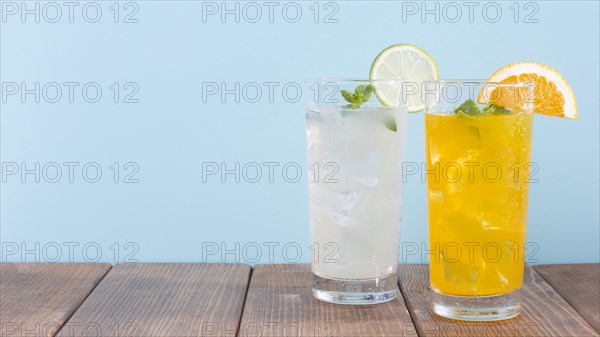 Glass with orange lemonade drink