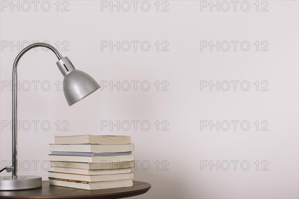 Table with lamp books. Resolution and high quality beautiful photo