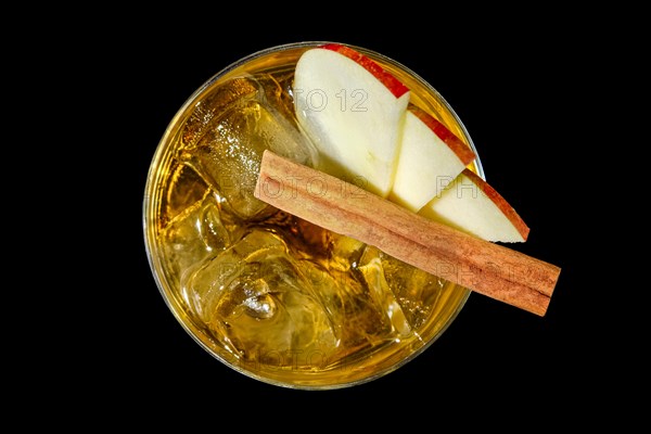 Top view of whiskey with apple juice