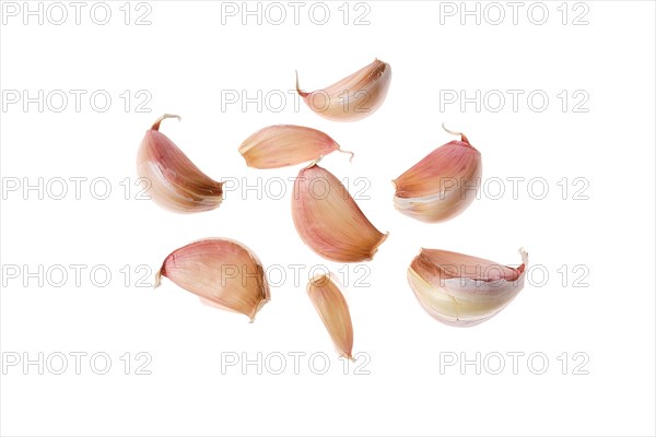 Cloves of garlic isolated on white
